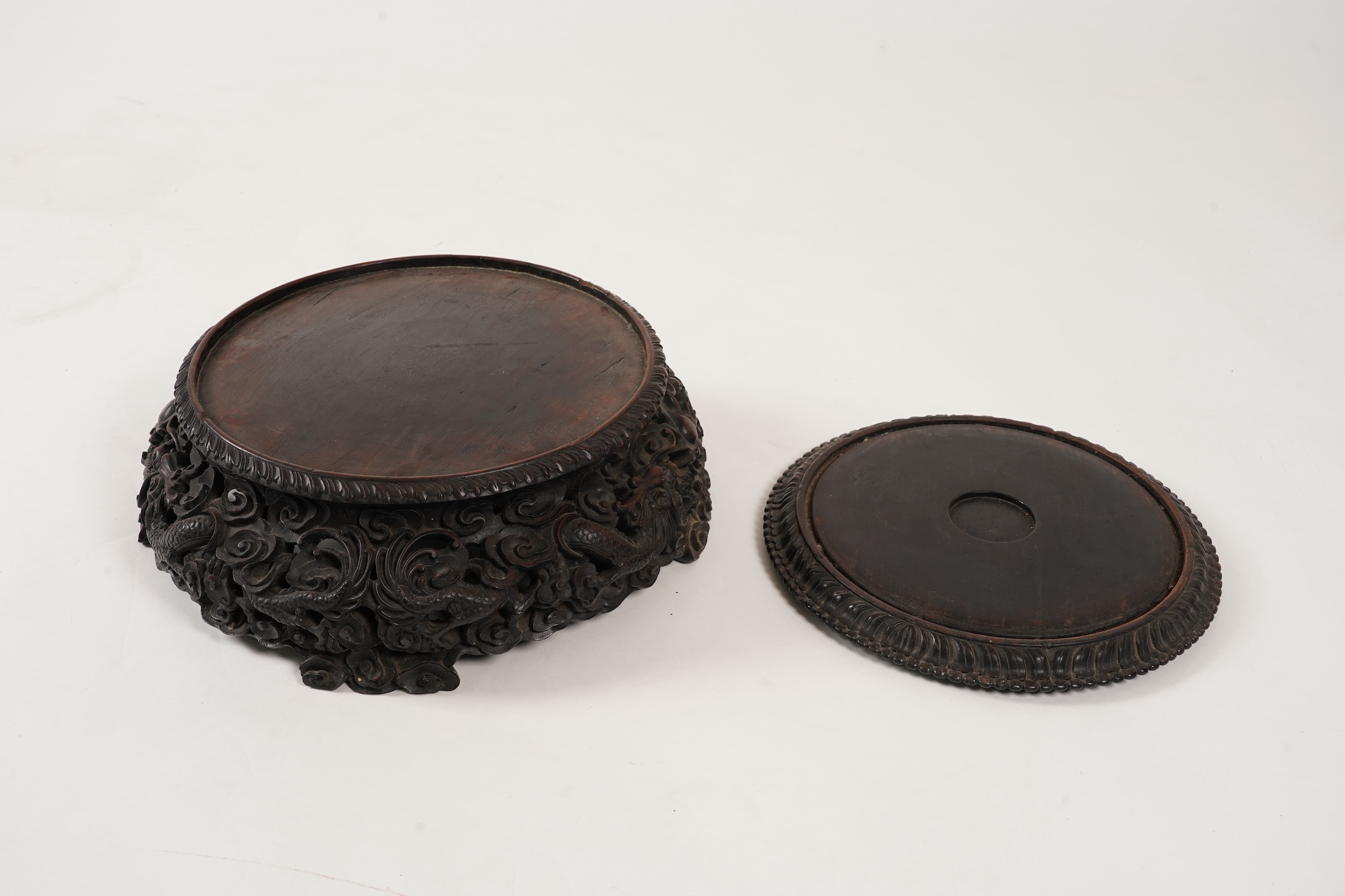 An impressive Chinese hongmu ‘dragon’ stand, late 19th century
